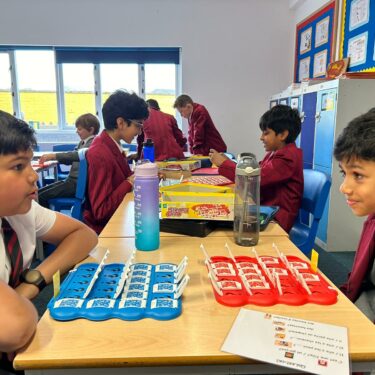 students playing board games