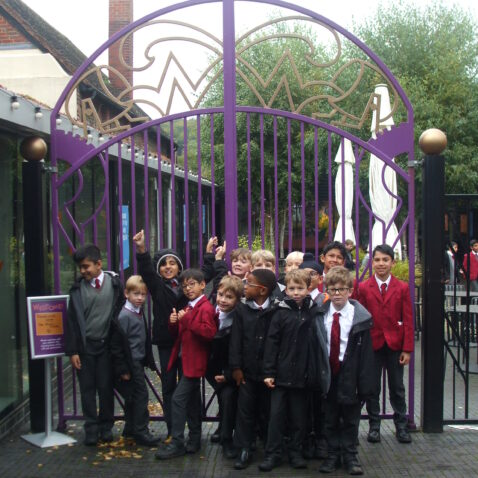 students by a gate