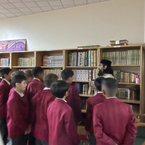 students on a school trip in a masjid